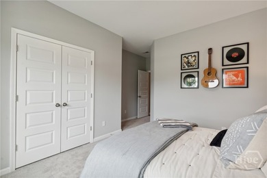 This single-story Harrisburg home design features three bedrooms - photo 20