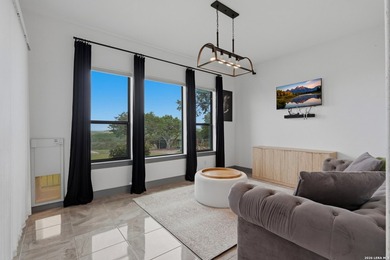 Watch the entire back wall of this home disappear, opening your - photo 20