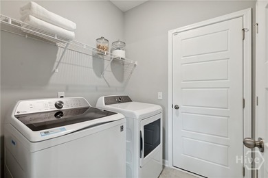 This single-story Harrisburg home design features three bedrooms - photo 21