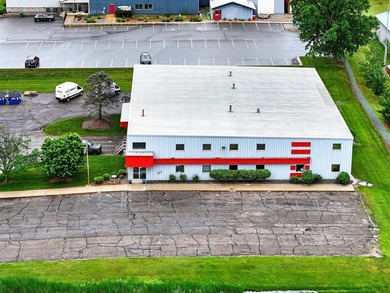 Property has been a Office supply business and warehouse - photo 2
