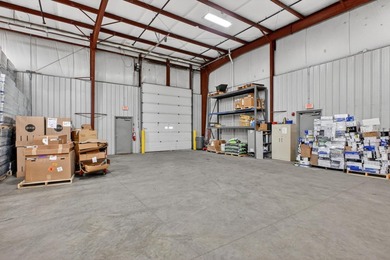 Property has been a Office supply business and warehouse - photo 8