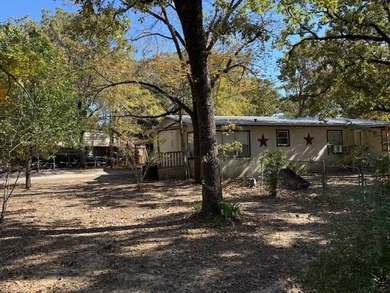 Lake Home For Sale in Log Cabin, Texas