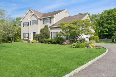 Welcome to 3 Naomi Court, a timeless 5-bedroom, 4.5-bath Center - photo 3