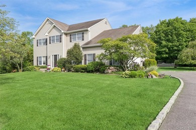 Welcome to 3 Naomi Court, a timeless 5-bedroom, 4.5-bath Center - photo 4