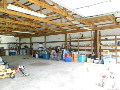 1.19 acres with a 50 x 60 insulated shop w/electric. Many - photo 12