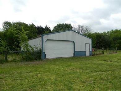 1.19 acres with a 50 x 60 insulated shop w/electric. Many - photo 23