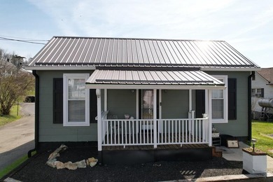 Step into this completely remodeled 1900 home in the heart of - photo 2