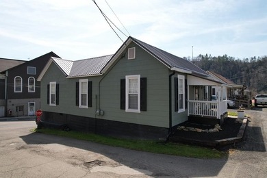 Step into this completely remodeled 1900 home in the heart of - photo 3