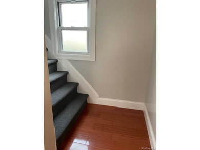 Welcome to this beautifully renovated single-family brick home - photo 2