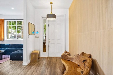 A beautiful 5 BD 3 BA two-story home in Boca Vistas with chic - photo 2