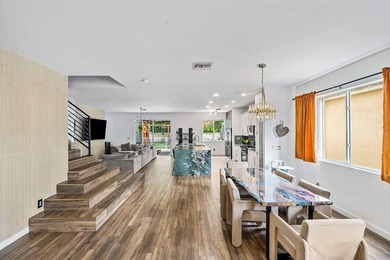A beautiful 5 BD 3 BA two-story home in Boca Vistas with chic - photo 3