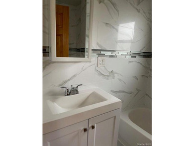 Welcome to this beautifully renovated single-family brick home - photo 6