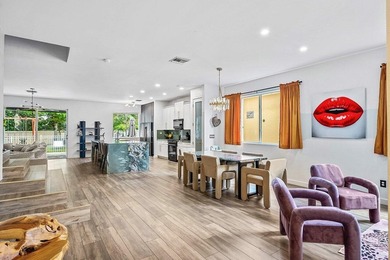 A beautiful 5 BD 3 BA two-story home in Boca Vistas with chic - photo 6