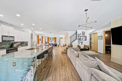 A beautiful 5 BD 3 BA two-story home in Boca Vistas with chic - photo 10