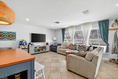 Welcome to this charming 4-bedroom, 2-bathroom home with a 2-car - photo 11