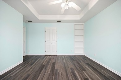 Beautifully positioned on the water along Laguna Shores, this - photo 12