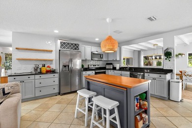 Welcome to this charming 4-bedroom, 2-bathroom home with a 2-car - photo 13
