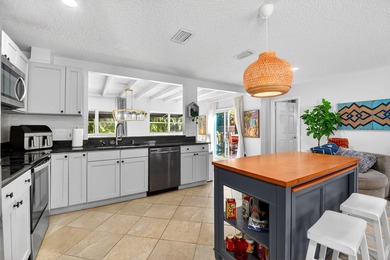 Welcome to this charming 4-bedroom, 2-bathroom home with a 2-car - photo 14