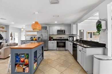 Welcome to this charming 4-bedroom, 2-bathroom home with a 2-car - photo 15