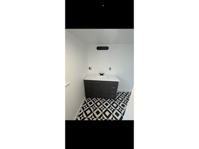 Seller has installed a new vanity in the bathroom and installed - photo 31