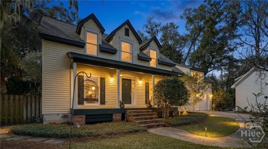 The welcoming front porch overlooks peaceful coastal marsh and - photo 34
