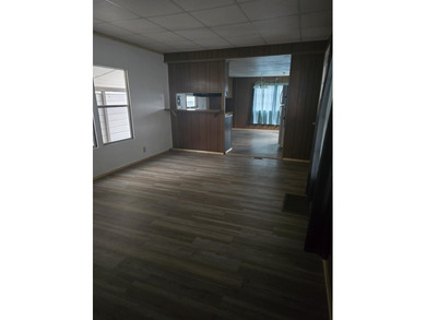 This 2 bedroom, 1 bathroom home offers practical living with a