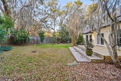 The welcoming front porch overlooks peaceful coastal marsh and - photo 36
