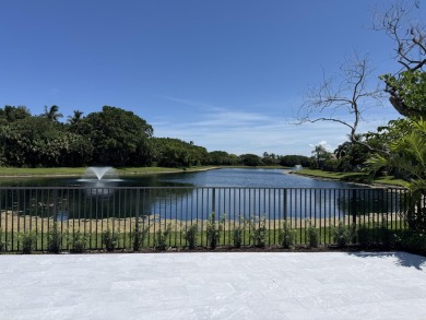 Lake Home For Sale in Palm Beach Gardens, Florida