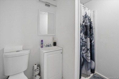 Opportunity Knocks in Mastic Beach! Situated on a spacious - photo 9
