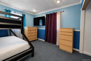 Opportunity Knocks in Mastic Beach! Situated on a spacious - photo 10
