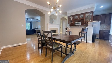 Stately Brick Townhouse (2 Car Garage End-Unit) in Sought-After - photo 3