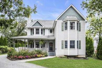 A grand wraparound porch welcomes you to this 5 bedroom/3.1 bath - photo 1