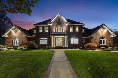 Welcome to an extraordinary lakefront estate in the prestigious - photo 2