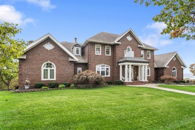 Welcome to an extraordinary lakefront estate in the prestigious - photo 3