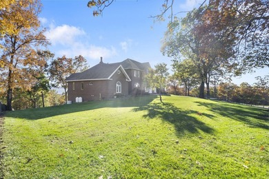 Welcome to an extraordinary lakefront estate in the prestigious - photo 4