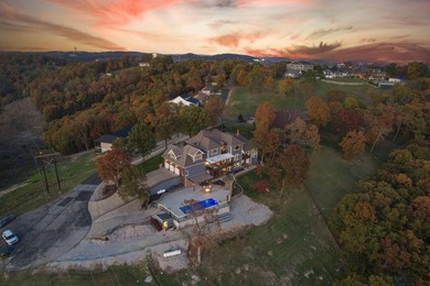 Welcome to an extraordinary lakefront estate in the prestigious - photo 6