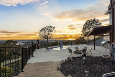 Welcome to an extraordinary lakefront estate in the prestigious - photo 10