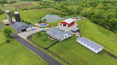 This exceptional farm offers a perfect blend of charm - photo 1