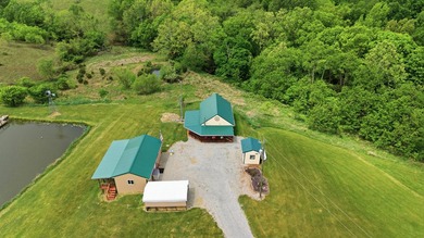 This exceptional farm offers a perfect blend of charm - photo 9