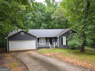 Welcome home to this charming one-level, three-bedroom, two-bath - photo 1
