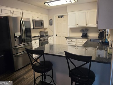 Welcome home to this charming one-level, three-bedroom, two-bath - photo 8