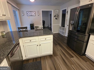Welcome home to this charming one-level, three-bedroom, two-bath - photo 10