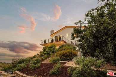 Set on a private acre overlooking the Pacific, 5904 Kanan Dume - photo 22