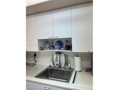 This beautifully maintained 2-bedroom, 2-bath condo offering 1