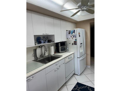 This beautifully maintained 2-bedroom, 2-bath condo offering 1