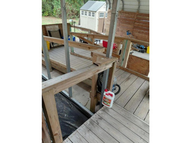 This 2-bedroom, 2-bathroom log cabin offers rustic charm. It is - photo 7