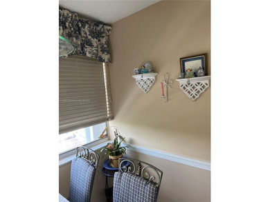 This beautifully maintained 2-bedroom, 2-bath condo offering 1