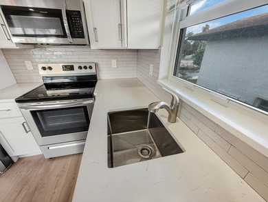 *** FULLY RENOVATED IN 2023 *** IMPACT WINDOWS! NEW FLOORS! NEW - photo 3