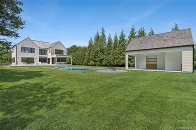 Tucked behind a curtain of privacy hedges and located south of - photo 31