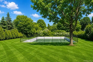 Tucked behind a curtain of privacy hedges and located south of - photo 34